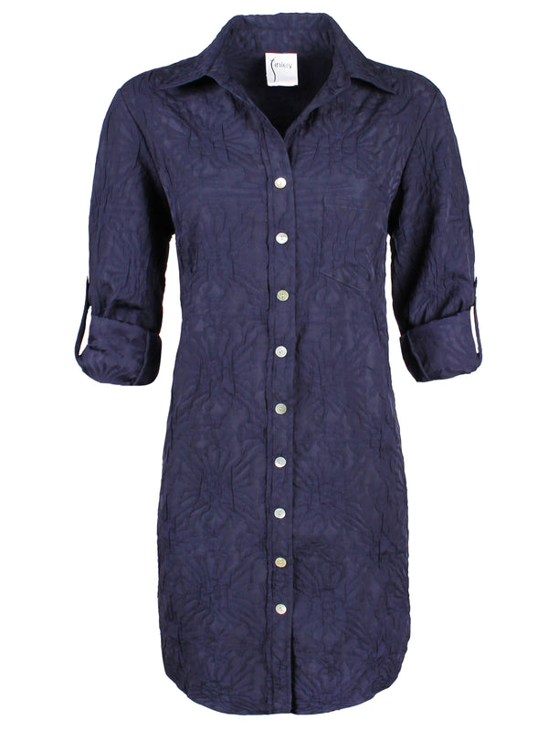 A front view of the Finley Alex shirt dress, a knee-length navy shirt dress in crushed textured jacquard with a relaxed contour.