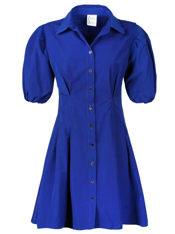 A front view of the Finley Avery dress, a royal blue pleated mini shirt dress in taffeta with puff sleeves and a fitted shape.