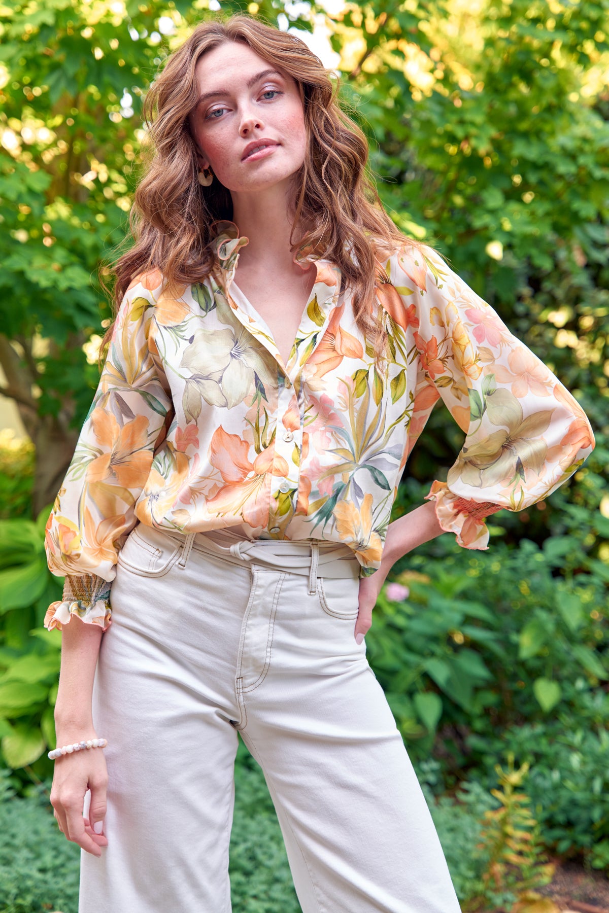 Model wears Finley Fiona floral print cotton shirt with ruffled band collar, button front, and 3/4 raglan blouson sleeves