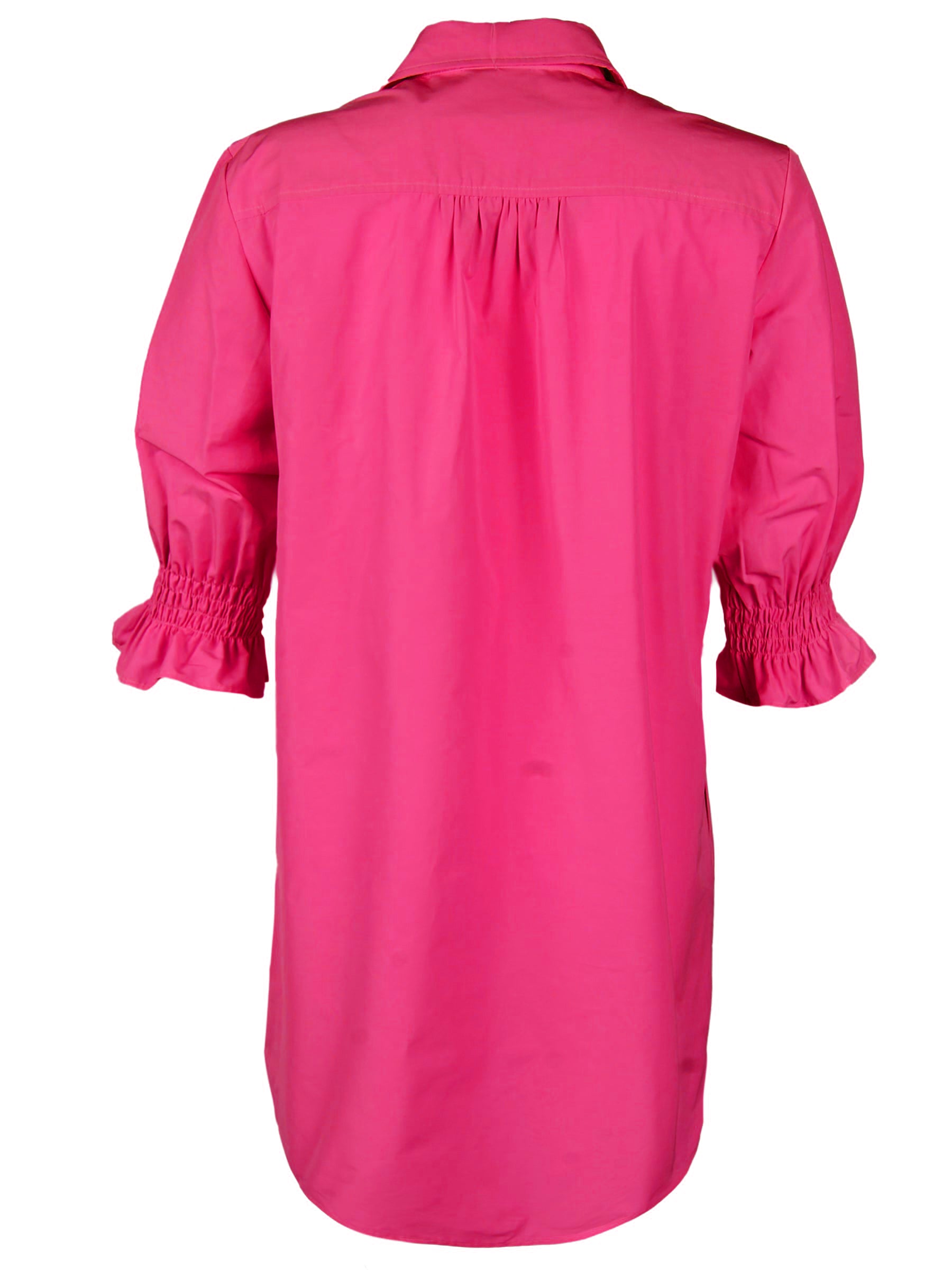 a back view of the Miller shirt dress in fuschia, with puff sleeves and a relaxed silhouette