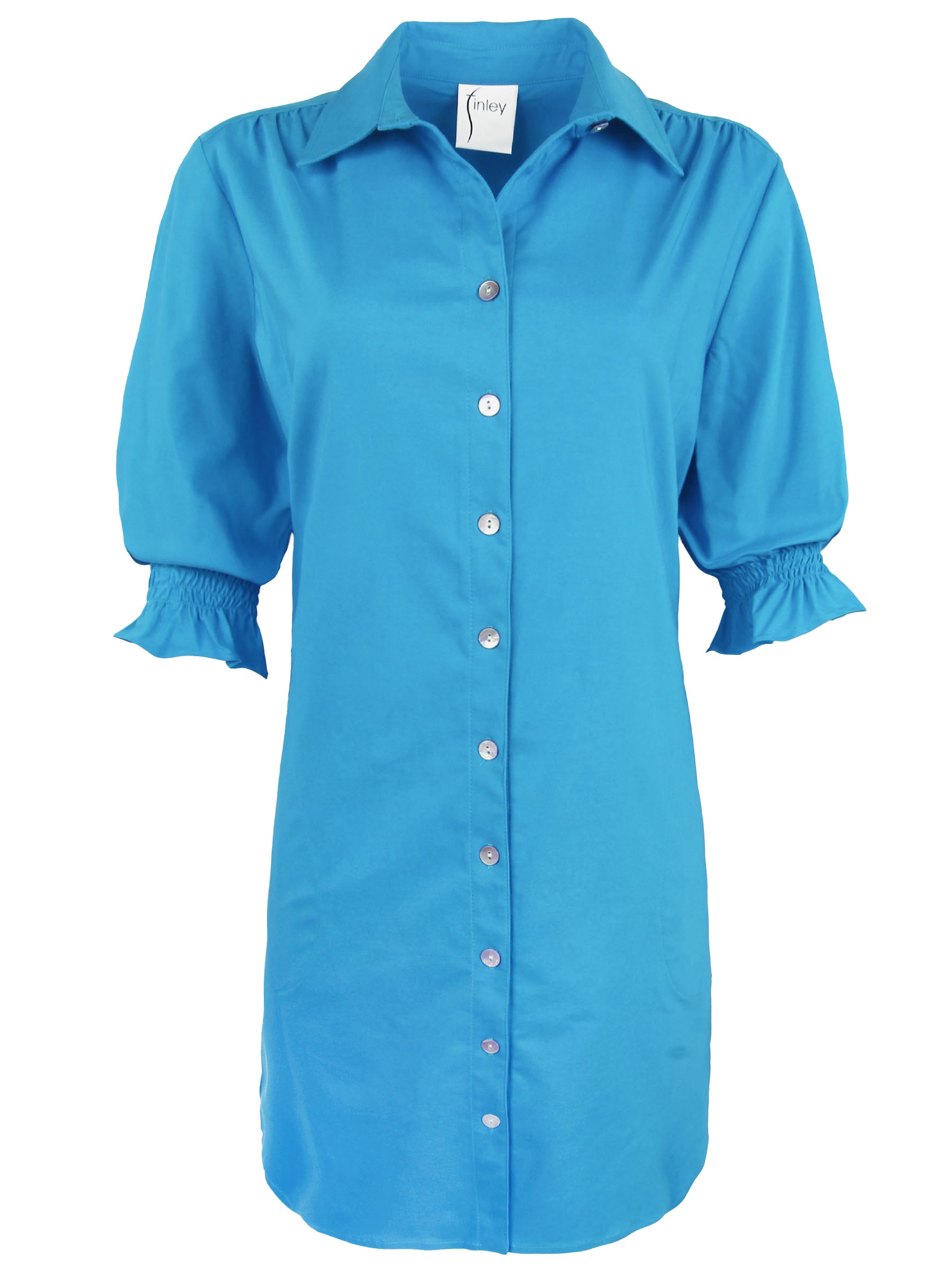 a front view of the Miller shirt dress in turquoise, showcasing pockets and elastic puff sleeves