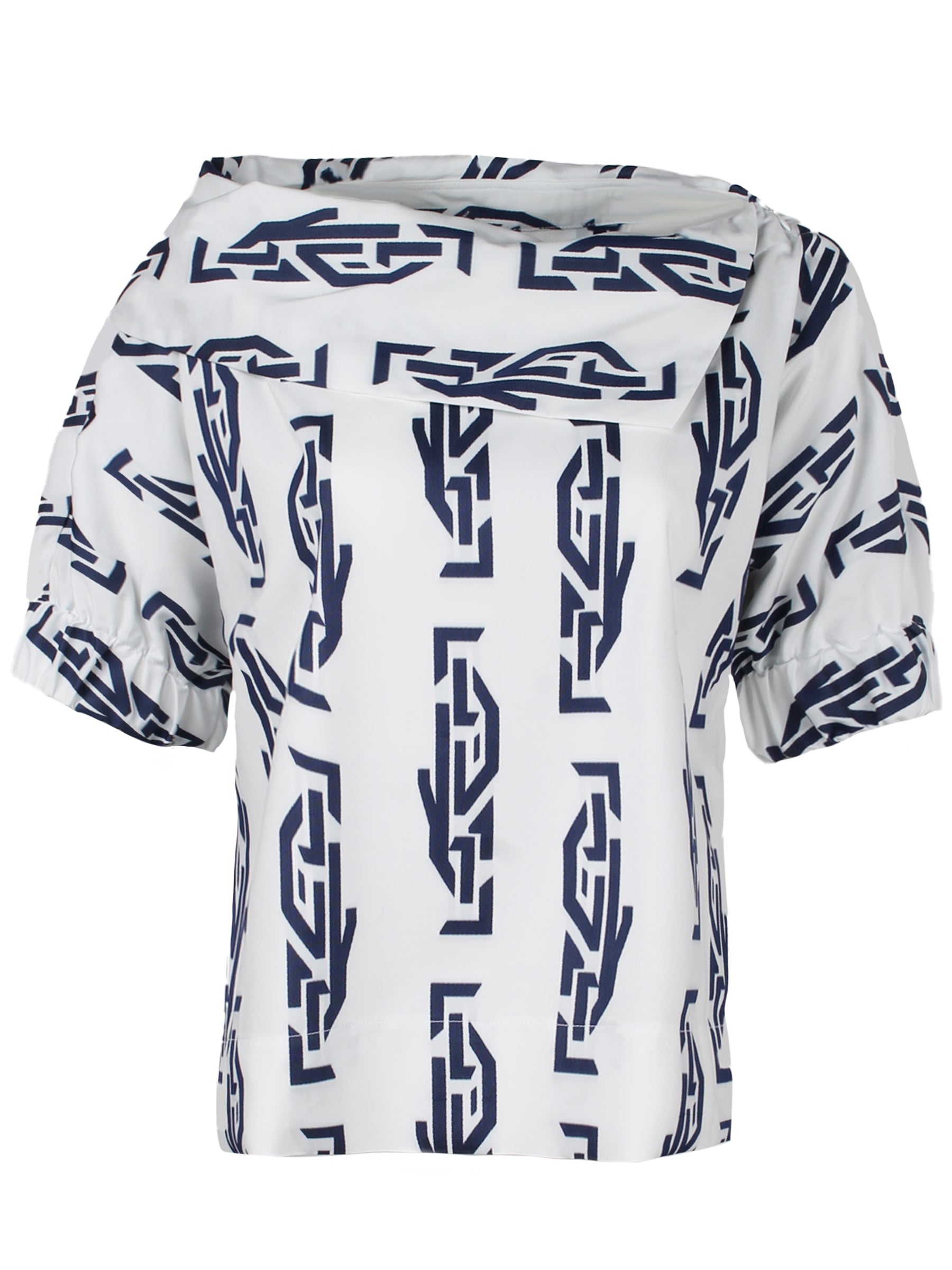 A front view of the Finley Skipper blouse, a short sleeve cotton sateen top with an asymmetric collar and a navy geometric print.