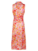 A rear view of the Finley Ellis dress, a sleeveless maxi tie front dress with a pink & orange floral print.