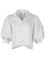 The Finley Bomba blouse, a casual white designer blouse with short puff sleeves and a relaxed fit.