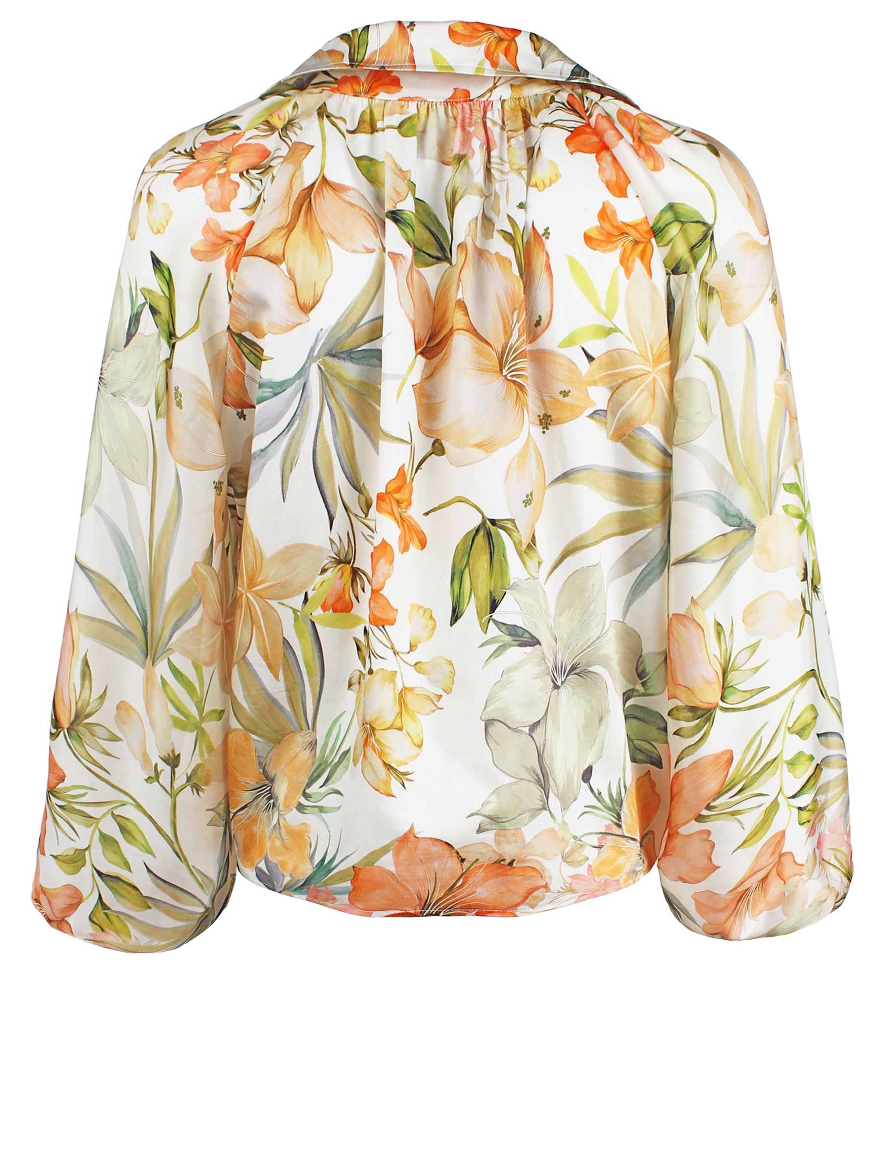 Back view of Finley Paloma floral print blouse in a relaxed fit. Floral print with smocked cuffs