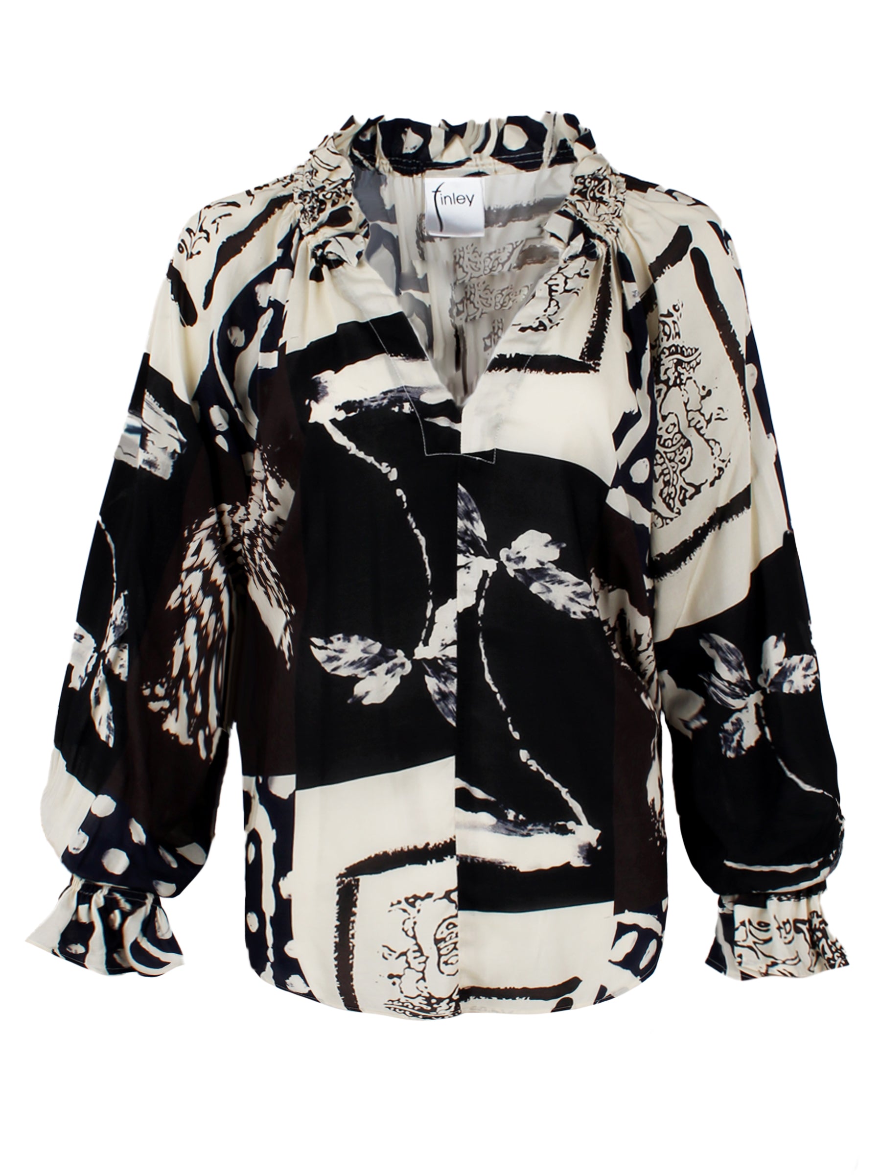 A front view of the Candace blouse, featuring ruffle trim, a popover design, oversize fit, blouson sleeves, and a black & white Asian abstract print in rayon.