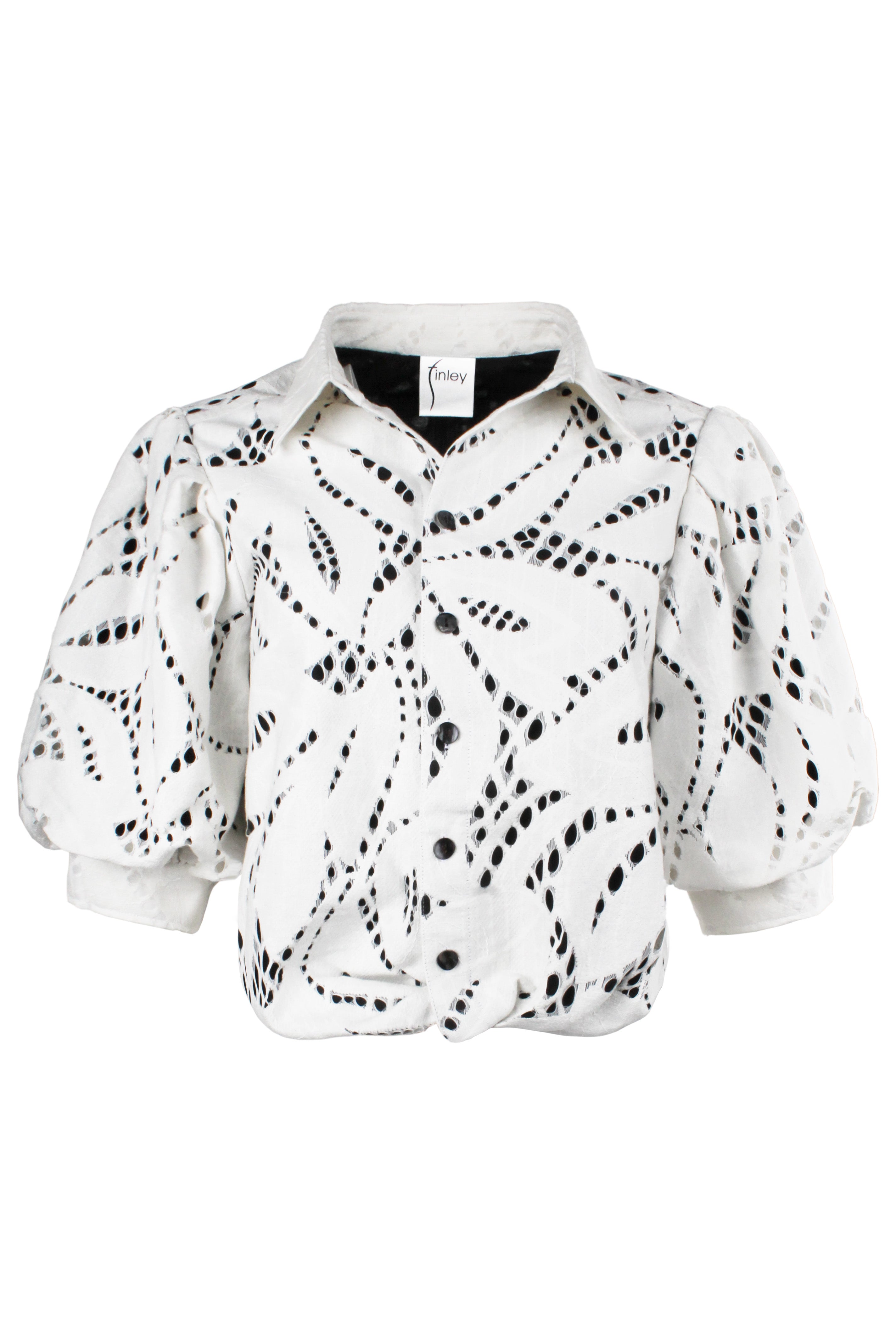 White blouse with black pattern on a white background