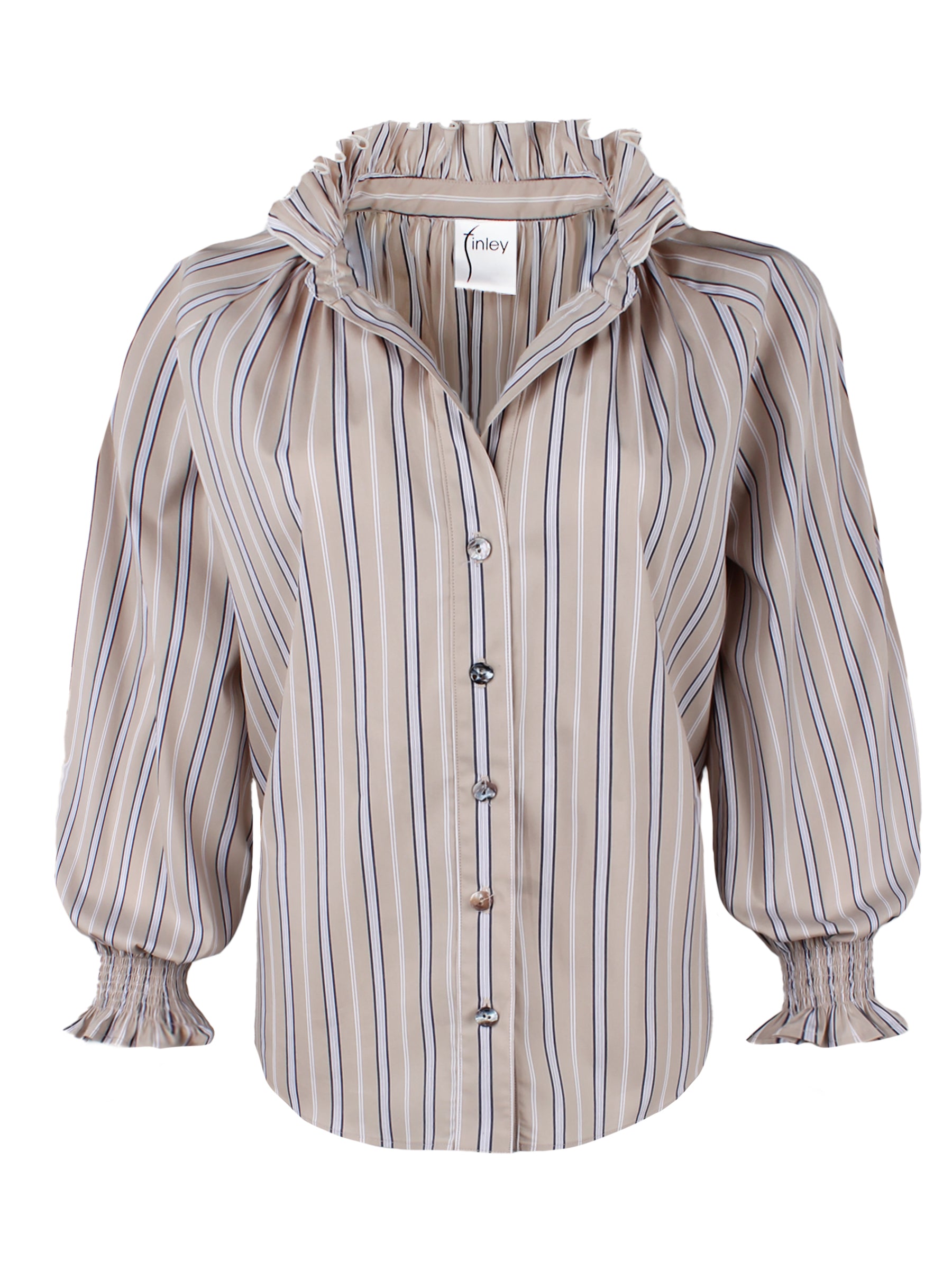 A model wearing the Fiona ruffle blouse, featuring a shirttail hem, café au lait stripes, a v-neckline, and blouson sleeves.