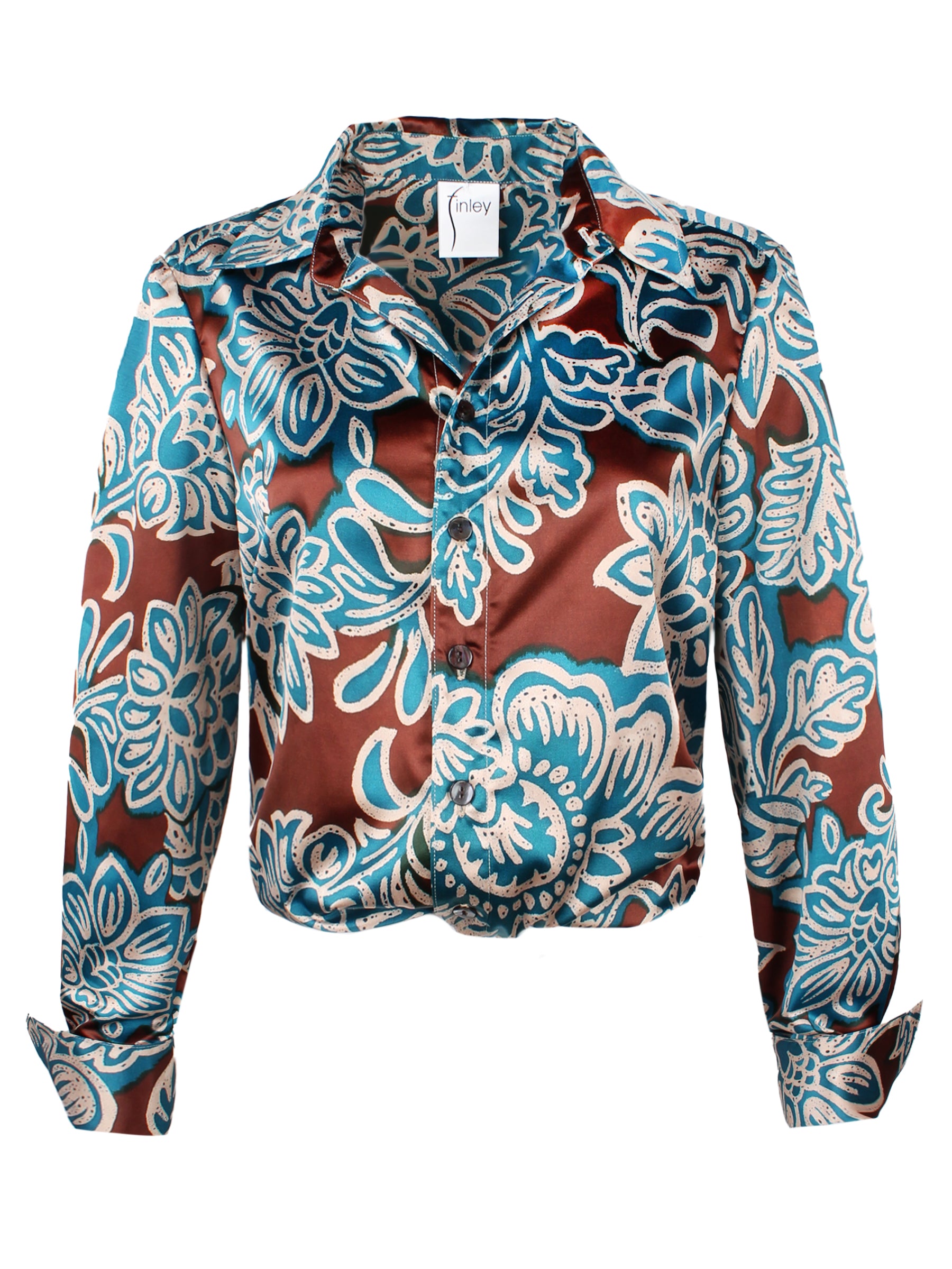 A front view of the Moxie blouse, made from satin in a turquoise and brown floral print, featuring a front-twist hem, cropped length, and relaxed fit.
