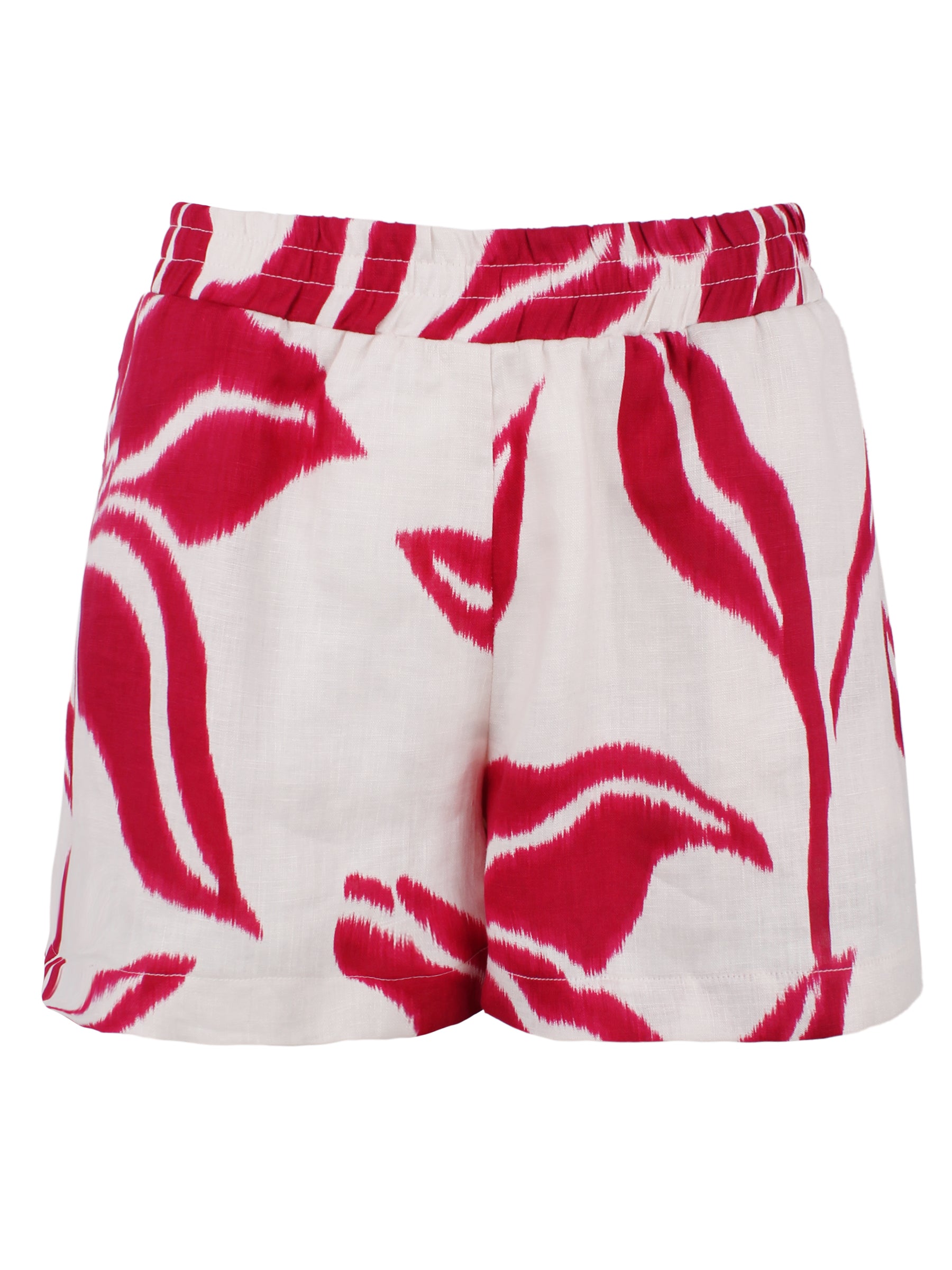 A back view of the Seaside shorts, showcasing a raspberry floral batik design in 100% linen with side pockets and a 3" inseam.