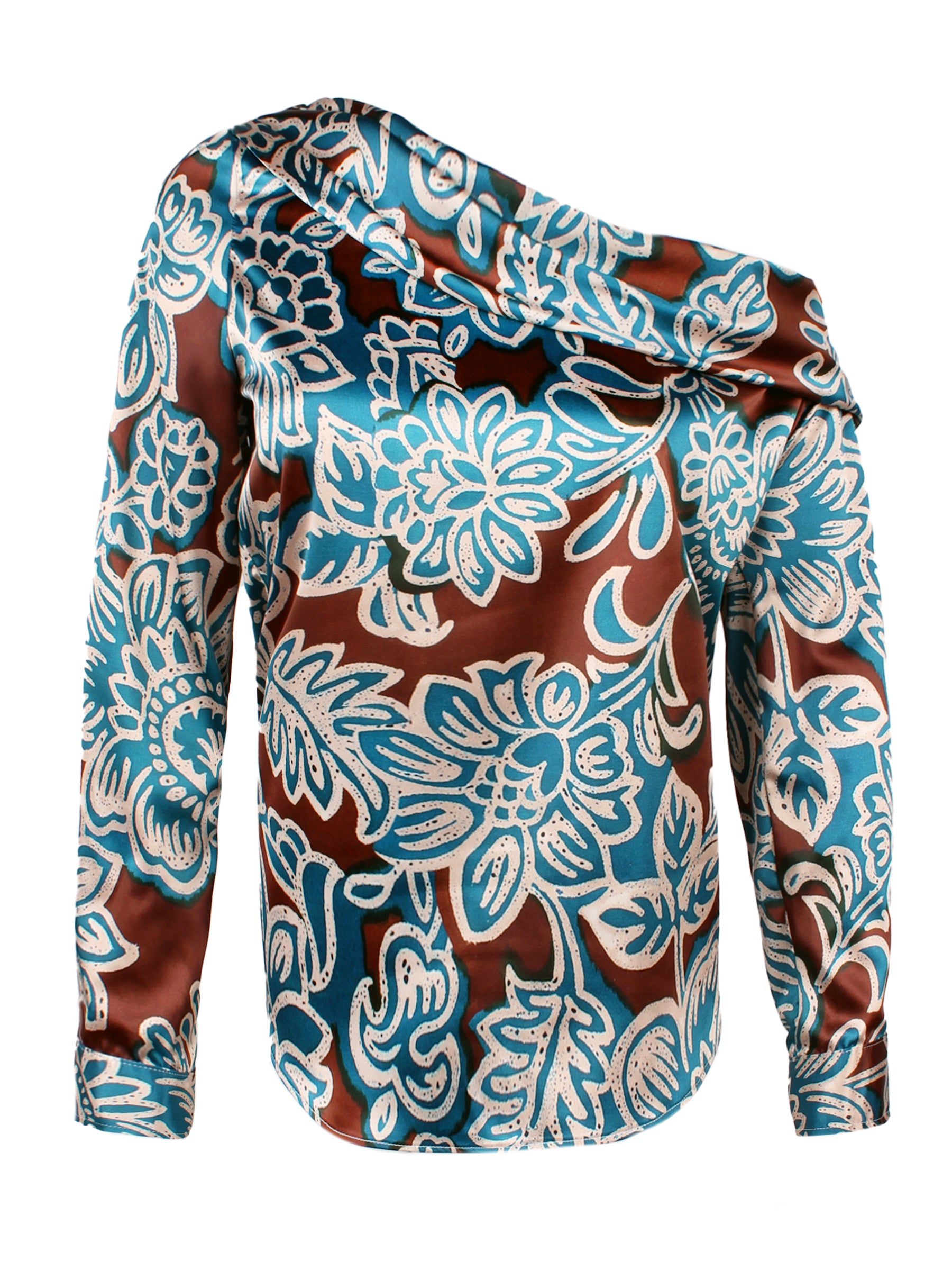 A model wearing the Finley Dani blouse, a long sleeve asymmetric satin off-shoulder top with a brown and turquoise floral print.