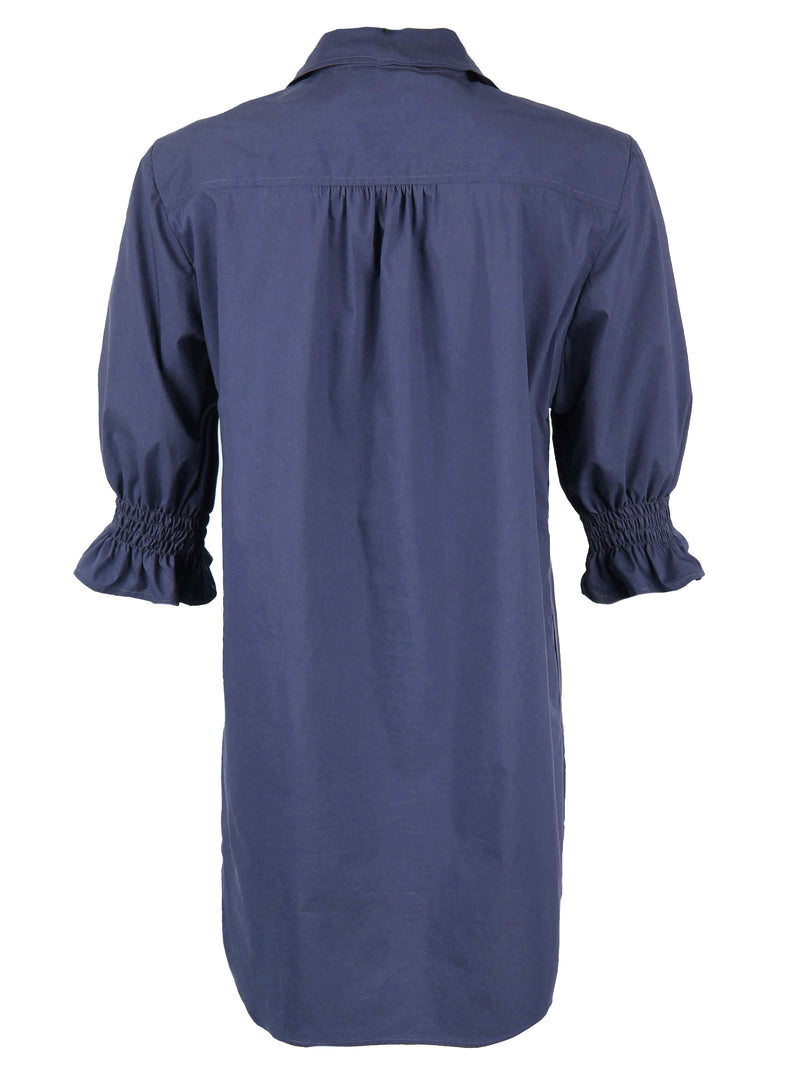 The Finley Miller shirt dress, a cotton black button-down shirt dress with elbow-length puff sleeves.