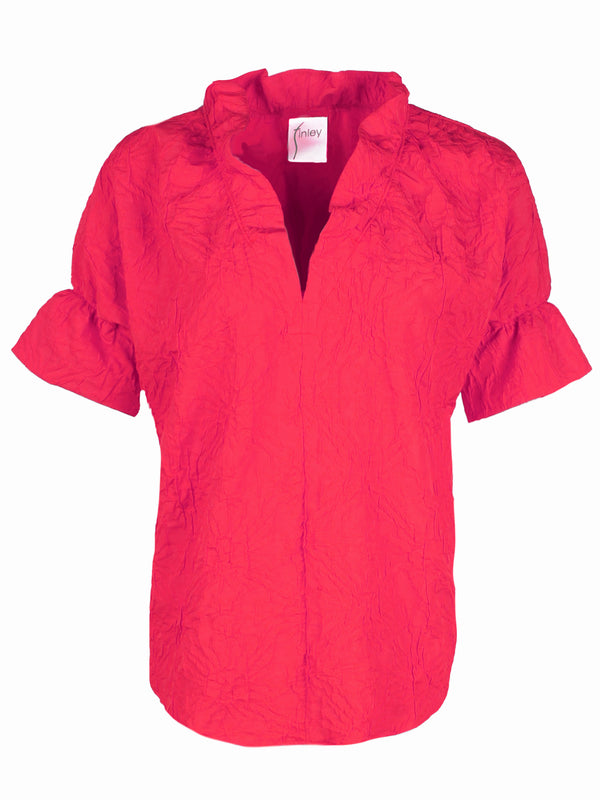 A front view of the Finley Crosby blouse, a short sleeve ruffle trim women's blouse in a textured raspberry red jacquard.