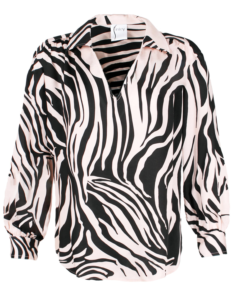 A front view of the Finley Davy blouse, a satin popover v-neck long sleeve blouse in a black and white zebra print.