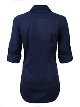 A rear view of the Finley Joey designer blouse, a casual button down navy designer shirt with a vintage tailored fit.