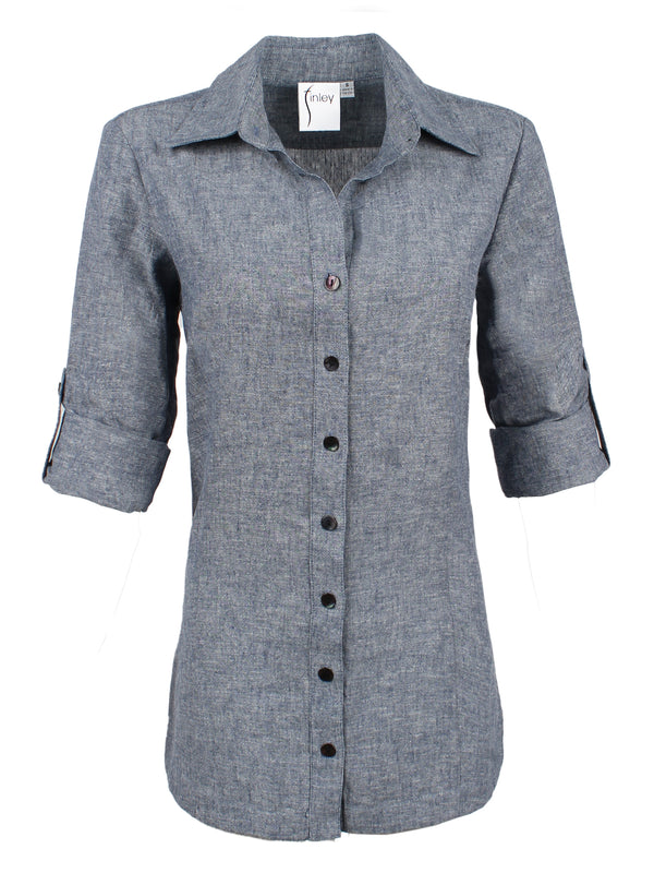 A front view of the Finley Joey blouse, a semi-fitted button down blue designer shirt made with chambray denim hemp.