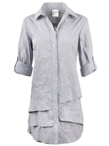 A front view of the Jenna shirt dress, a crushed gray and white pinstripe button-down womens shirt dress with ruffle tier hem.