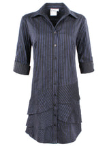 A front view of the Finley Jenna dress, a black & blue striped shirt dress with a relaxed contour and ruffle hem accents.