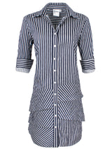 A front view of the Finley Jenna dress, a navy & white spectator stripe shirt dress with a relaxed contour and ruffle hem accents.