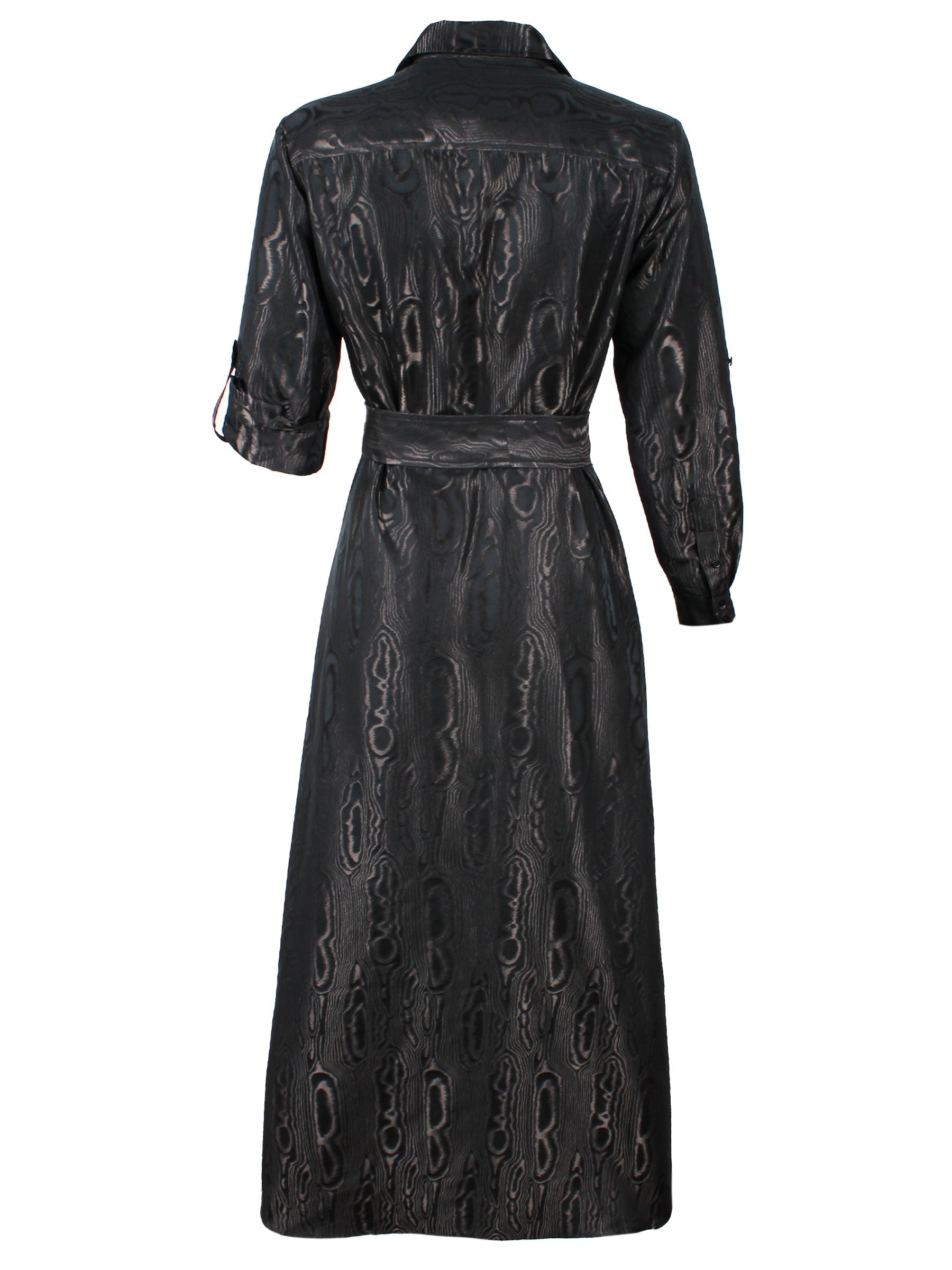 A rear view of the Finley Laine dress, a teal long sleeve tie front maxi dress with tonal moire jacquard embroidery and a self-tie belt.
