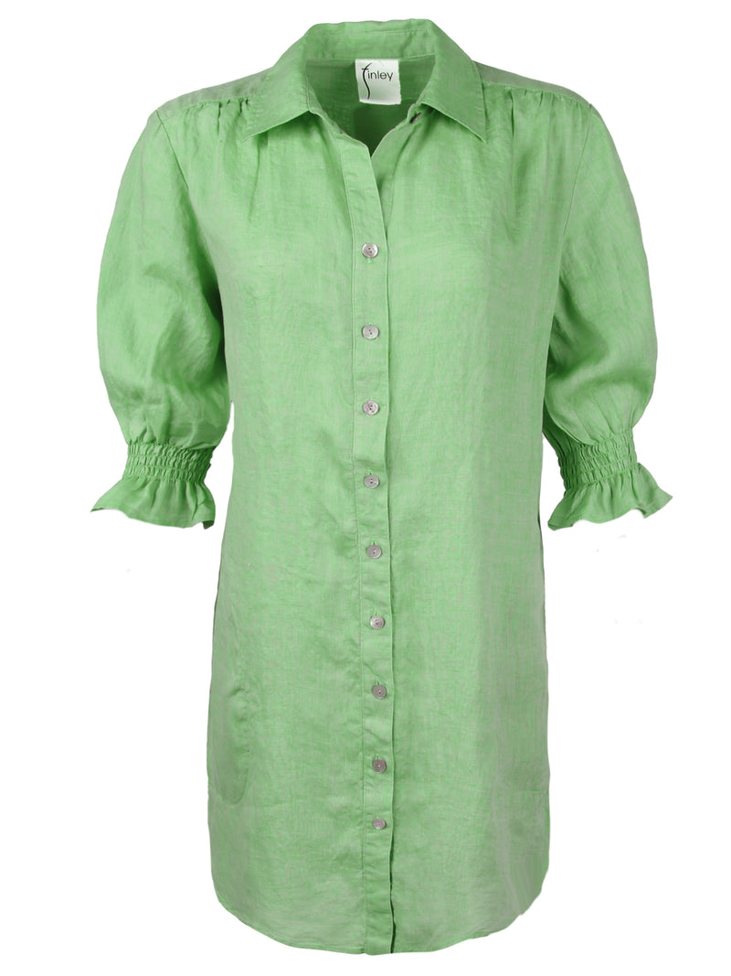 A front view of the Finley Miller shirtdress, a pale green washed linen button down shirt dress with short puff sleeves. 