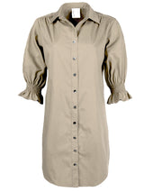 The Finley Miller shirt dress, a tan weathercloth (cotton poly) button down designer shirt dress with a relaxed shape.