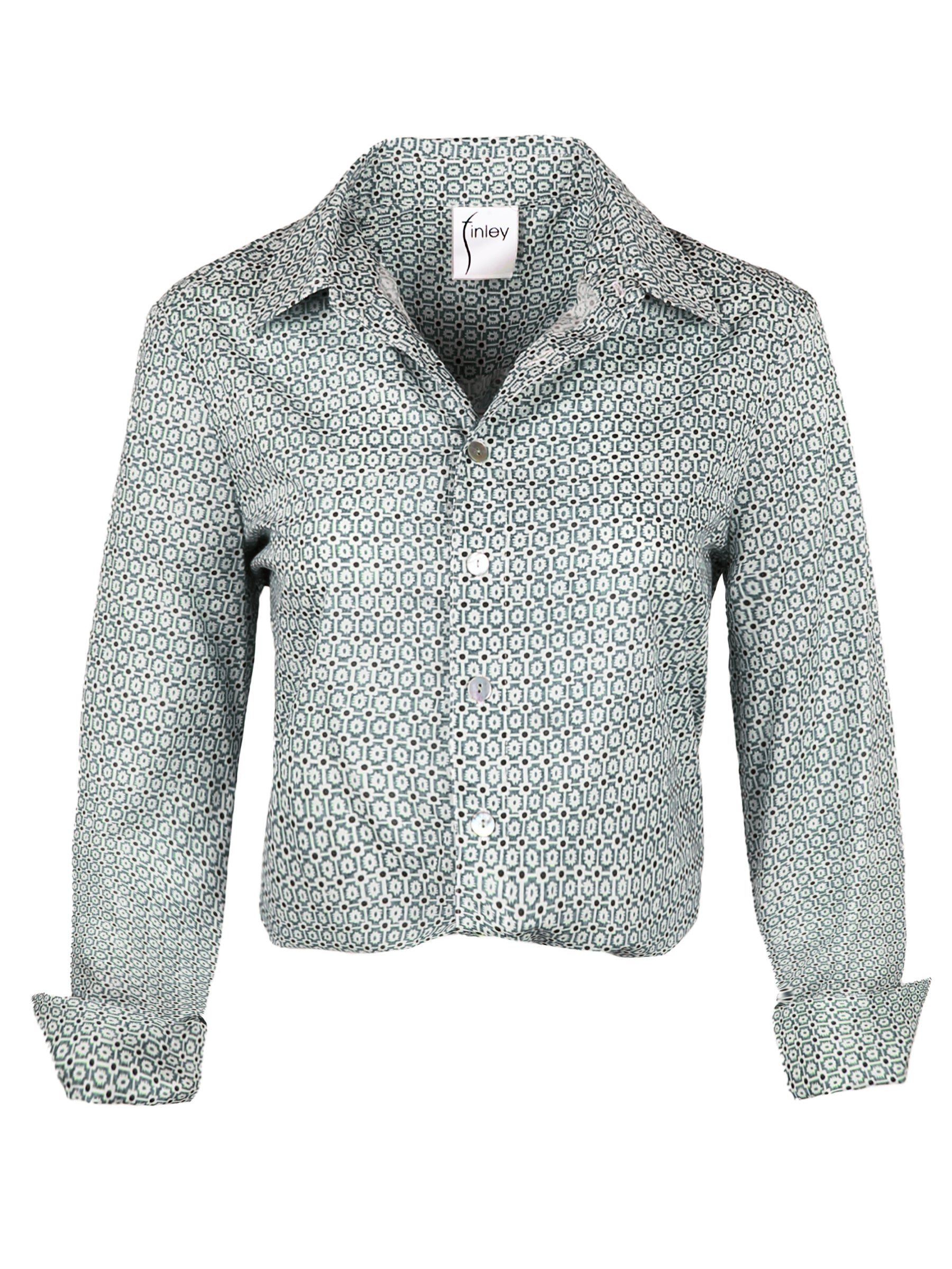 A front view of the Moxie blouse, a womens cotton sateen blouse with a front-twist hem, a relaxed fit, and a geometric blue print.
