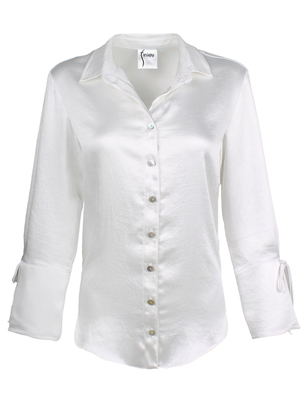 A front view of the Finley Rachel blouse, a ivory white satin button down oversize women's blouse with cuff self-ties and a point collar.