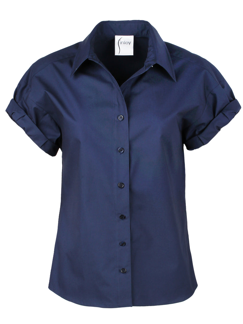 A front view of the Finley Camp Shirt, a navy cotton poplin shirt with short roll sleeves and a relaxed shape.