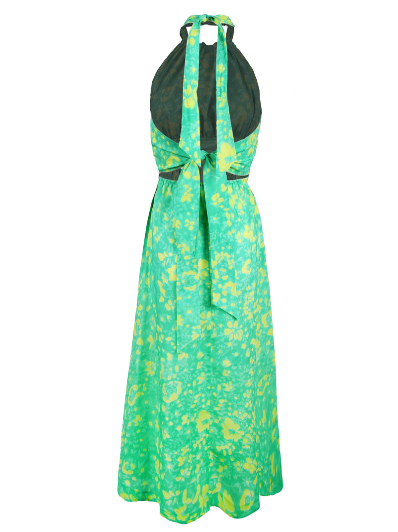A rear view of the Finley Cameron, a cotton halter top tie front maxi dress with a bright green floral motif.