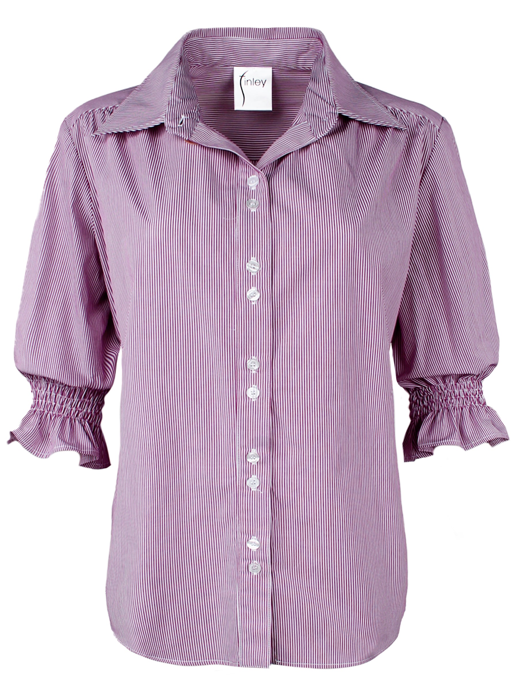 A front view of the Sirena shirt, a relaxed cotton piece with elbow-length puff sleeves and purple and white stripes.
