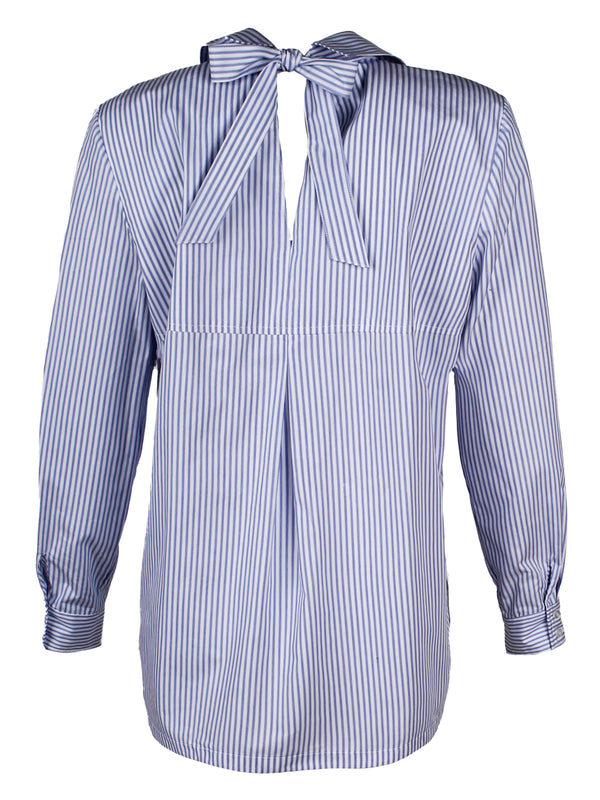 A front view of the Finley Sylvia blouse, a blue & white striped poplin blouse with a self-tying cutout back and a relaxed shape.