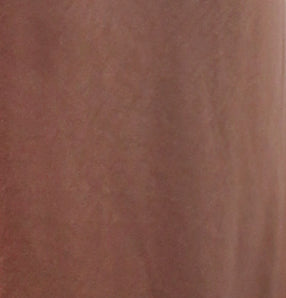 A close-up texture shot of a warm brown fabric or material surface.