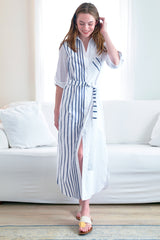 The Finley Alex shirt dress, a long maxi button-down shirt dress wth an a-line shape and embroidered navy ribbon stripes.