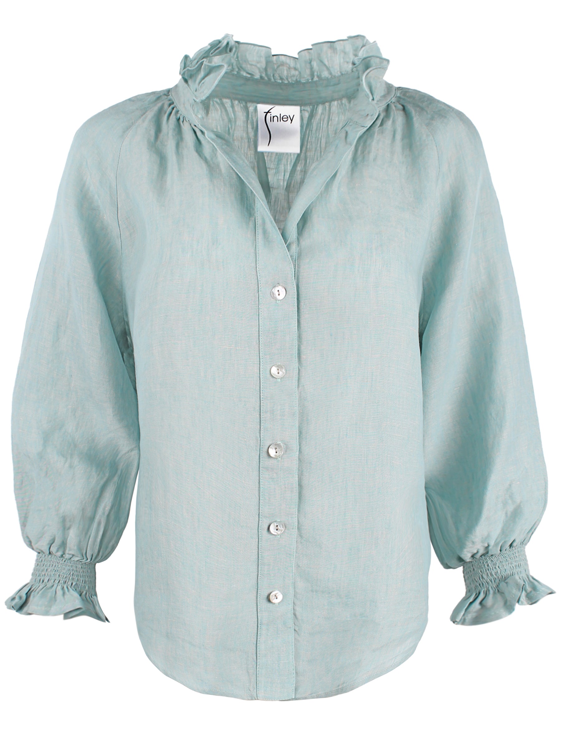 a front view of the Finley Fiona blouse with a ruffle collar, puff sleeves, button-down front, and made of washed linen.
