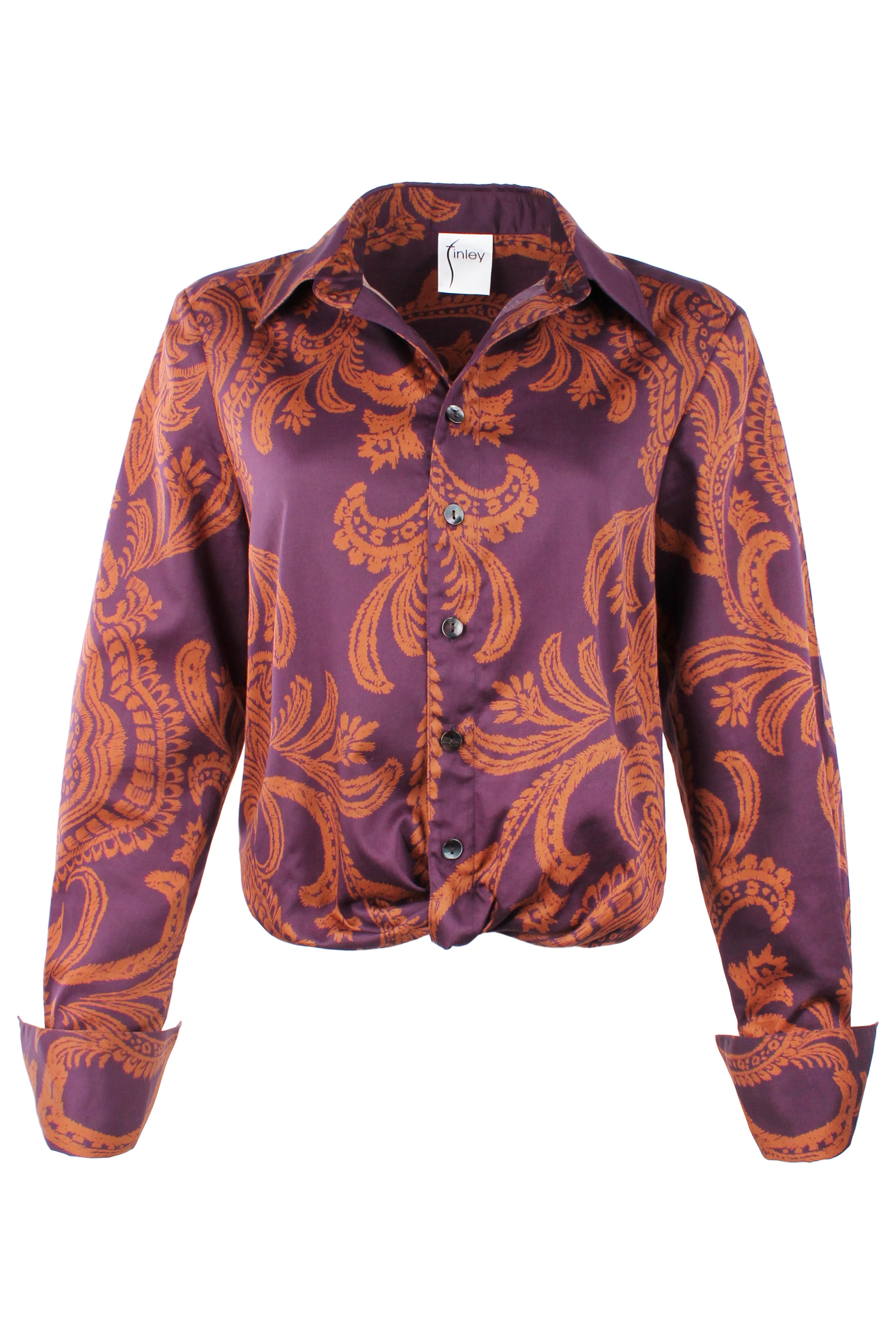 Purple and orange patterned shirt on a white background