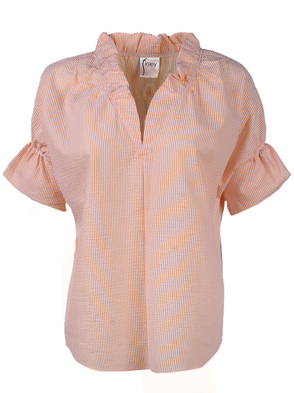 Front view of the Crosby blouse, a casual popover women's shirt with ruffle detailing and an orange and white seersucker pattern.