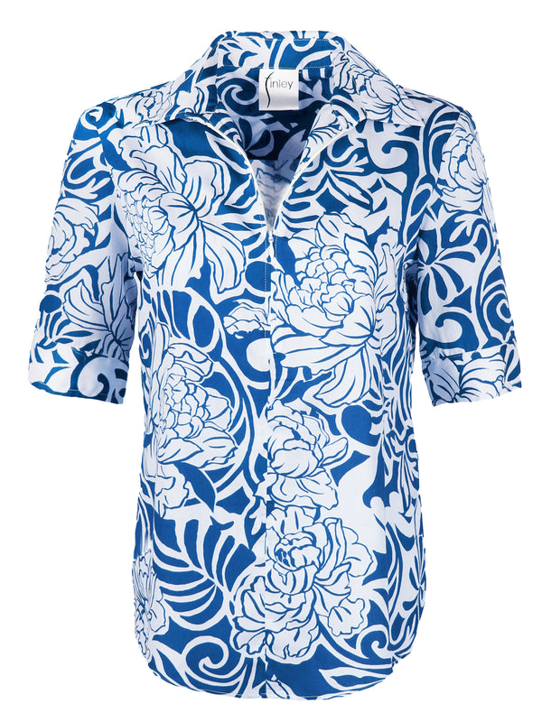 A front view of the Finley Endora shirt, a blue & white floral half-zip popover shortsleeve cotton blouse.