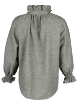 The Finley Fiona shirt, a washed hemp sage green chambray button down blouse with ruffle detailing on collar and sleeves - rear view