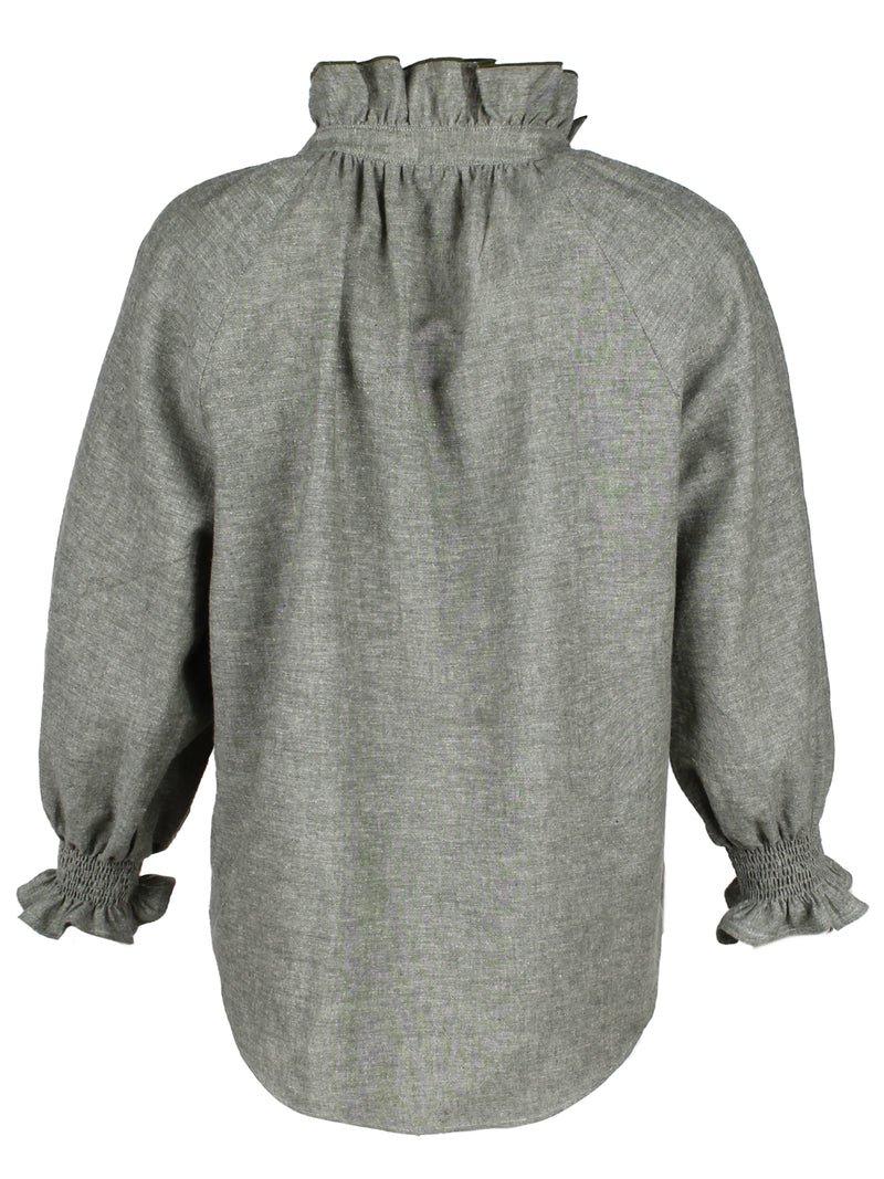 The Finley Fiona shirt, a washed hemp sage green chambray button down blouse with ruffle detailing on collar and sleeves - rear view