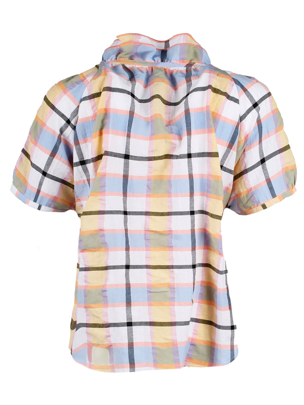 The Finley Frankie blouse, a blue & yellow plaid raglan sleeve v-neck camp shirt with ruffle trim detailing.