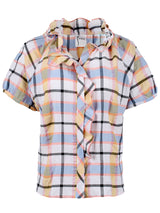 The Finley Frankie blouse, a blue & yellow plaid raglan sleeve v-neck camp shirt with ruffle trim detailing.