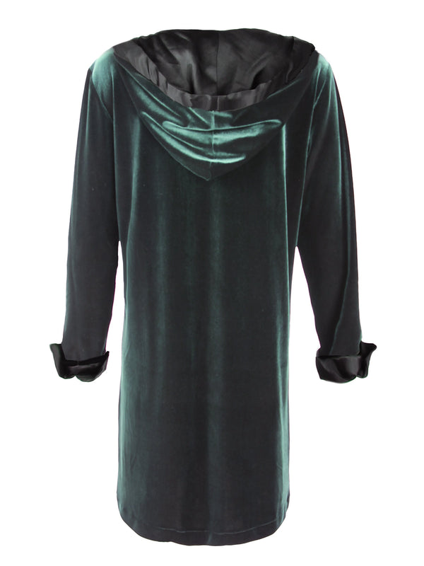 A rear view of the Finley Whisperweight Dress, a forest green velvet dress with a black hood, black satin trim, and a v-neckline.