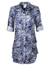 The Finley Jenna dress, a blue cotton floral print button-down shirt dress with a flounce hem and a relaxed fit.