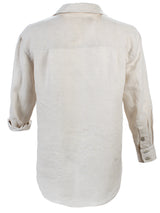 A rear view of Finley Monica shirt, an oversize washed linen long-sleeve button-down blush pink women's blouse.