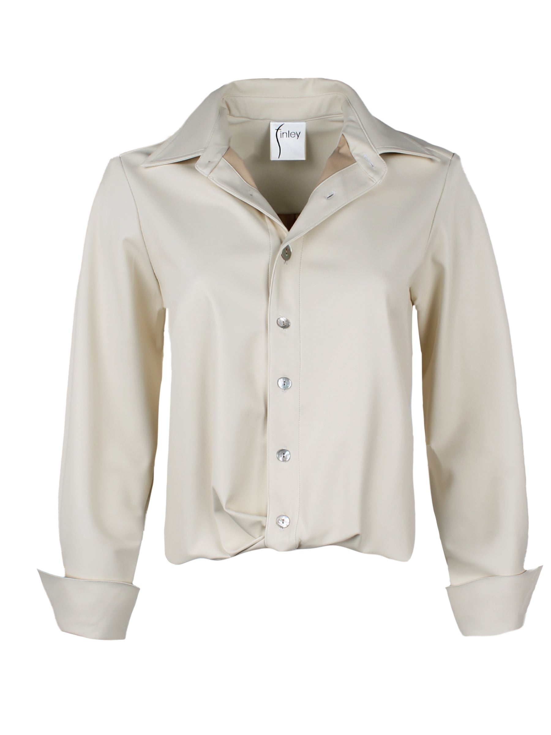 A front view of the Moxie shirt, made from vegan leather in ivory, featuring a front-twist elasticized hem, cropped fit, and long sleeves.
