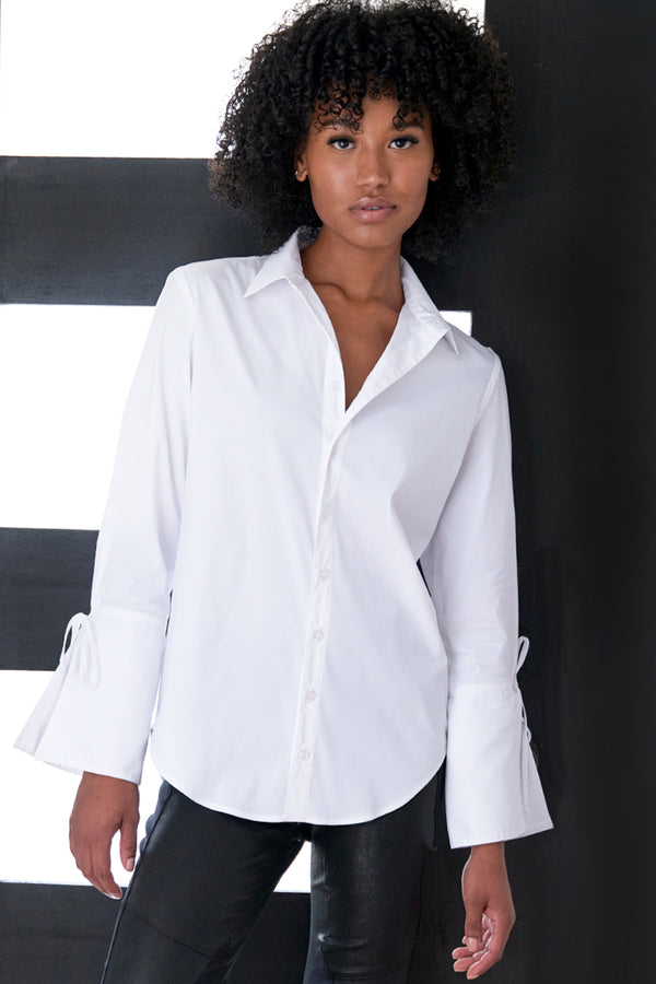 The Finley Rachel blouse, a white button-down women's poplin blouse with a point collar and self-tied cuffs.