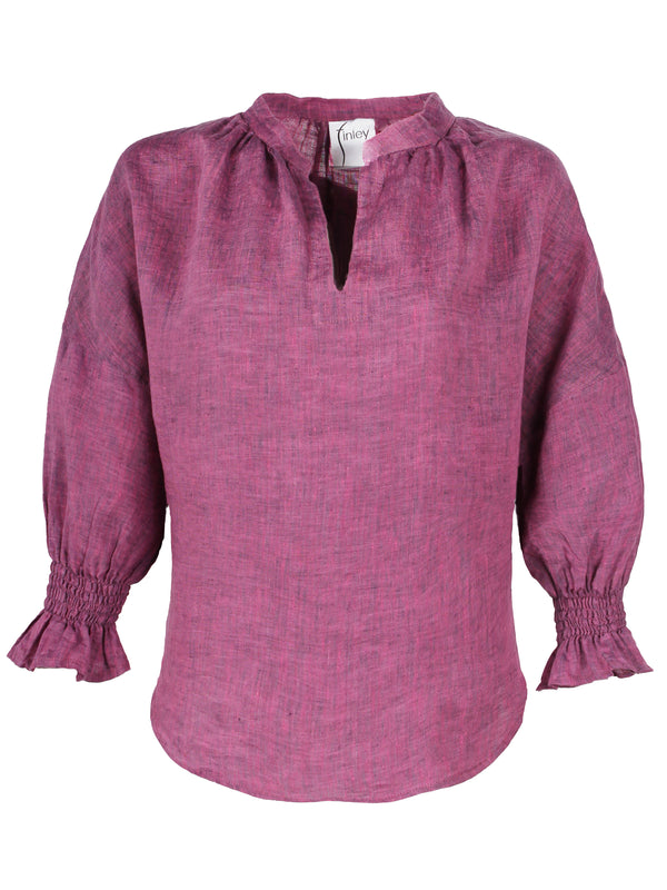 The Finley Rex blouse, a washed linen purple popover blouse with a Mandarin collar and puff sleeves.