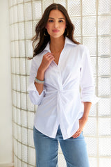 The Finley Sid shirt, a tailored button-down white cotton blouse with a tie front and a relaxed fit - model frontal