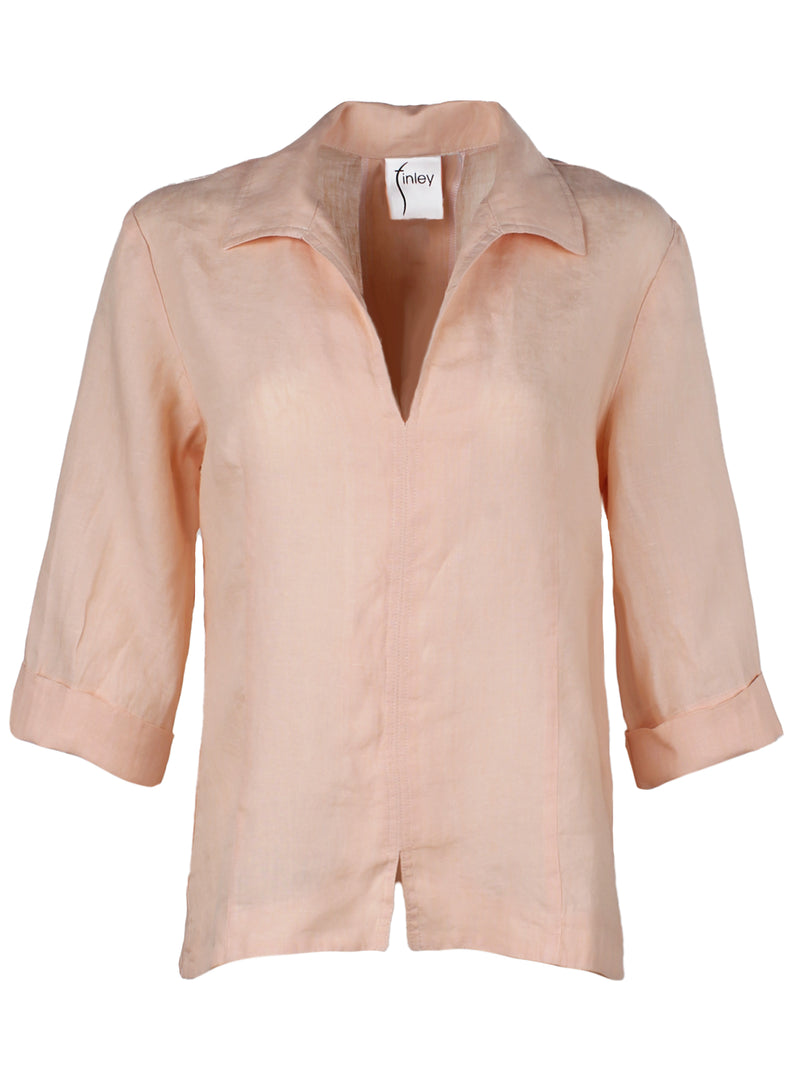 The Finley swing shirt, a peachy pink blush washed linen v-neck popover women's blouse with an inverted pleat.